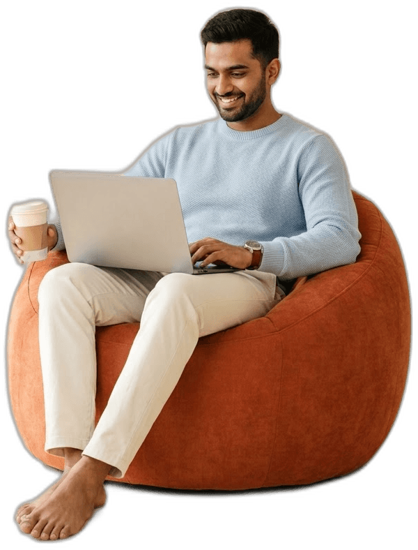 Recruiter working from a laptop on a terracotta bean bag chair